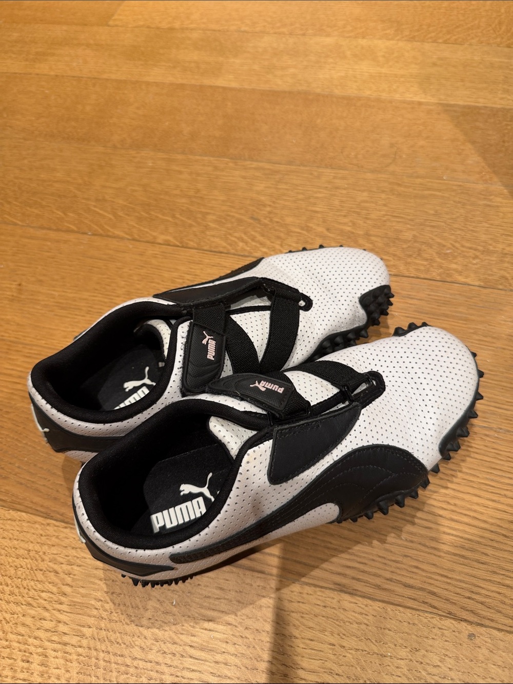 Puma White and Black Slip-On Athletic Sneakers